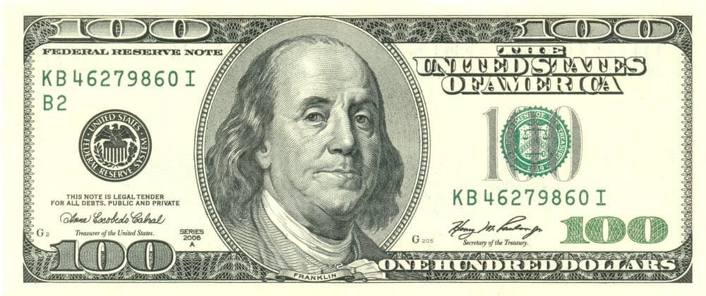 a close-up of a one hundred dollar bill