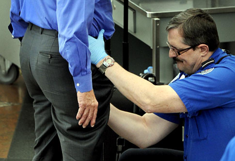 a doctor examining a patient's butt