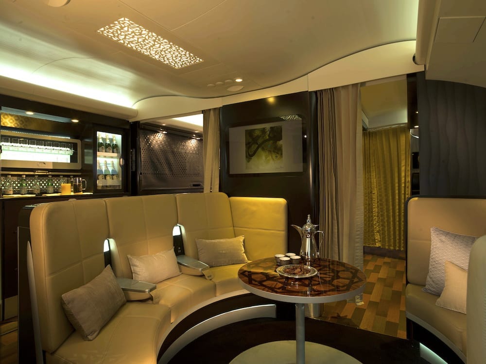 Sitting area and bar. Yes this is on an airplane.
