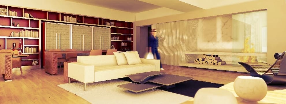 a living room with a white couch and a white rug