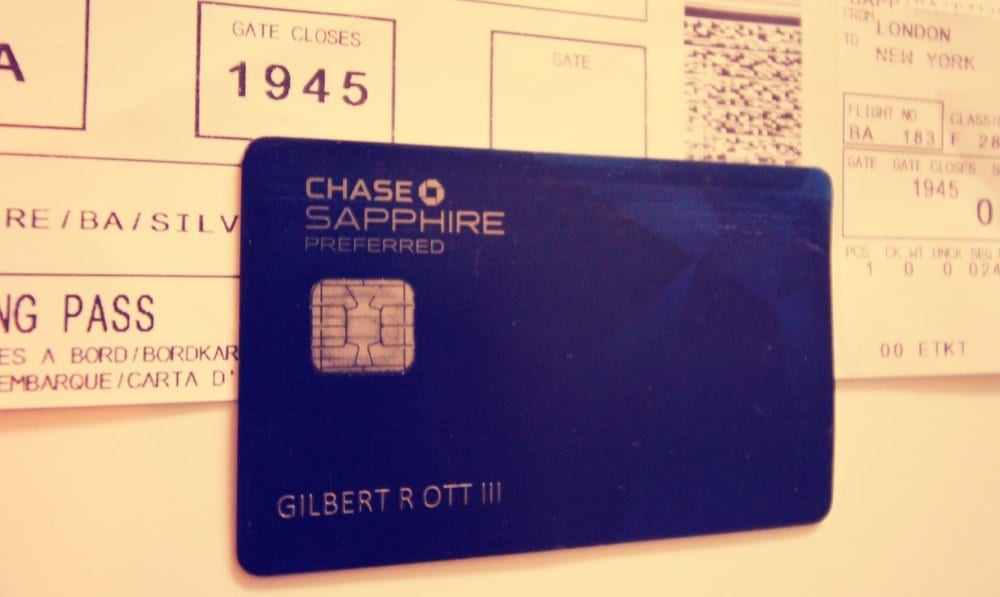 a blue credit card on a white background