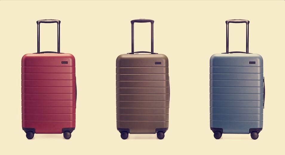 a group of suitcases on wheels