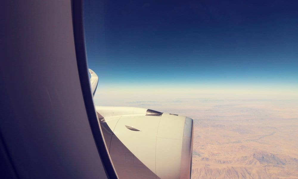 a view of the wing of an airplane