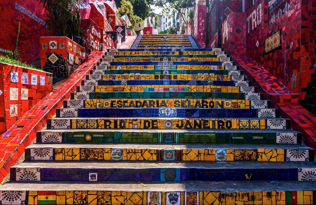 a colorful stairs with mosaic tiles