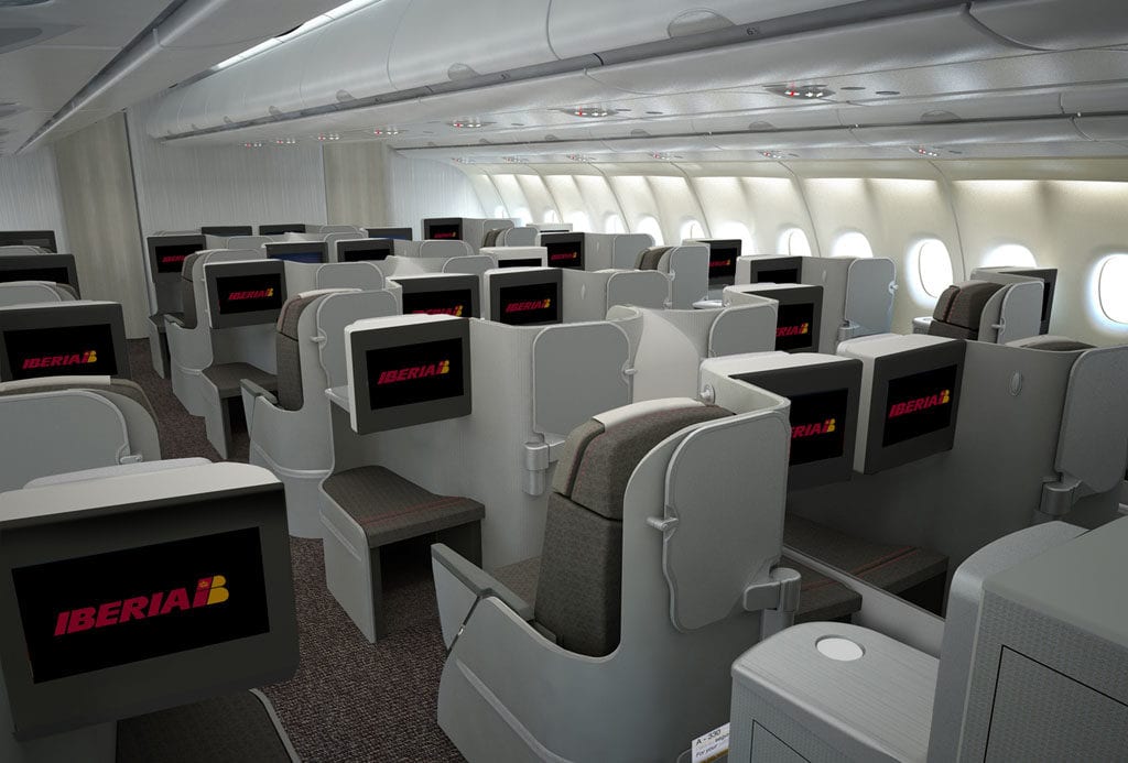 a plane with seats and monitors