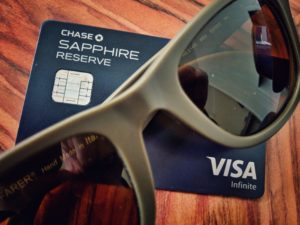 a credit card and sunglasses