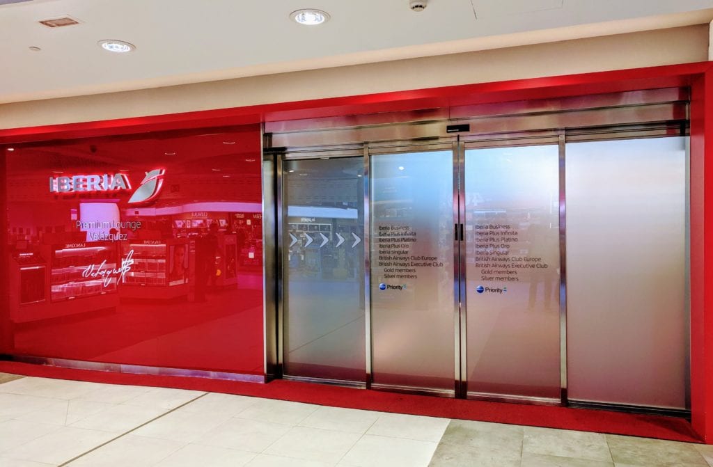 a red and silver elevator doors