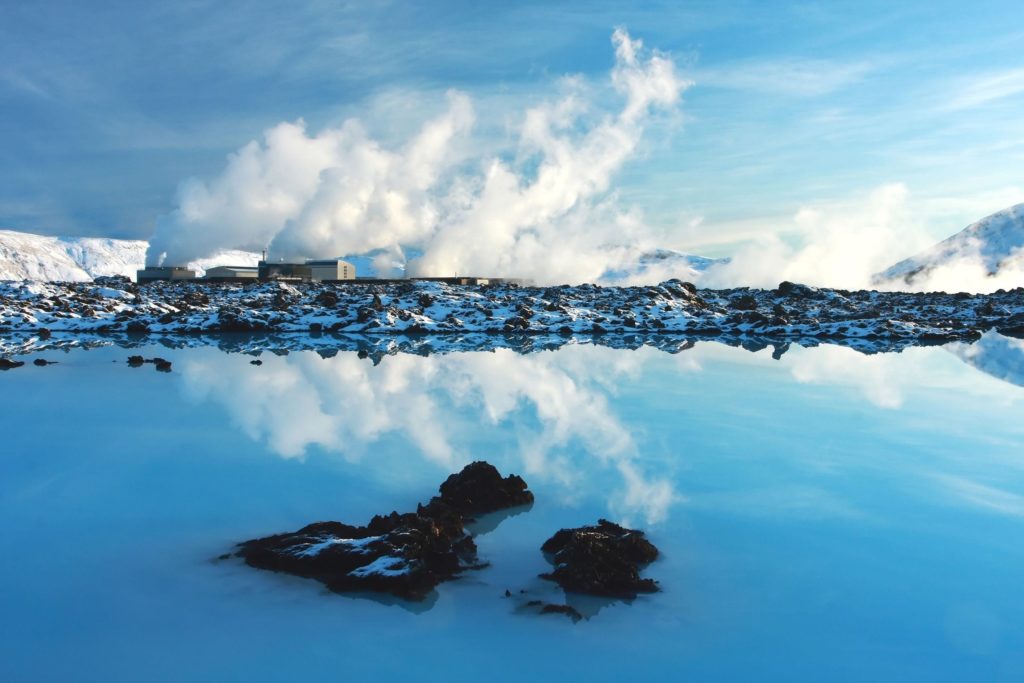 a body of water with Blue Lagoon in the background