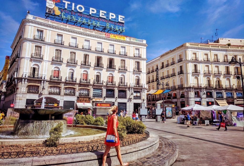 a woman walking in a city