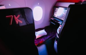 a tv in a chair in a plane