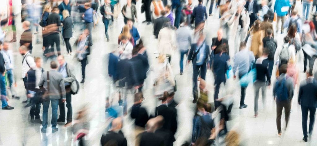 blurred people in a modern hall