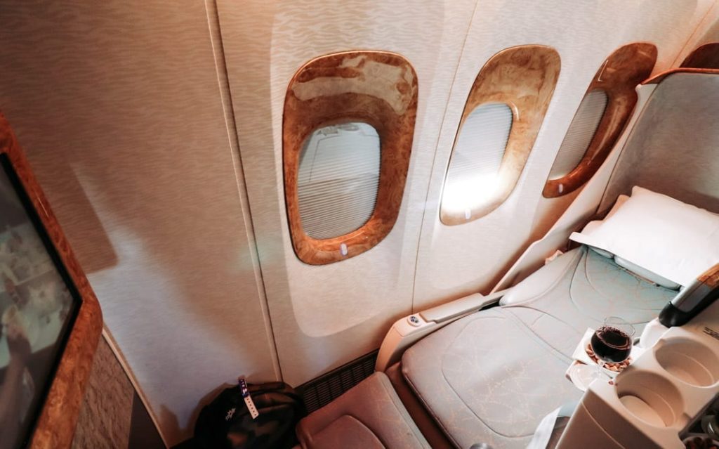a seat and window in an airplane