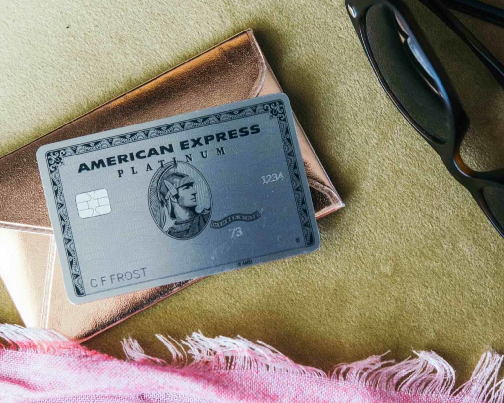 a credit card and wallet on a table