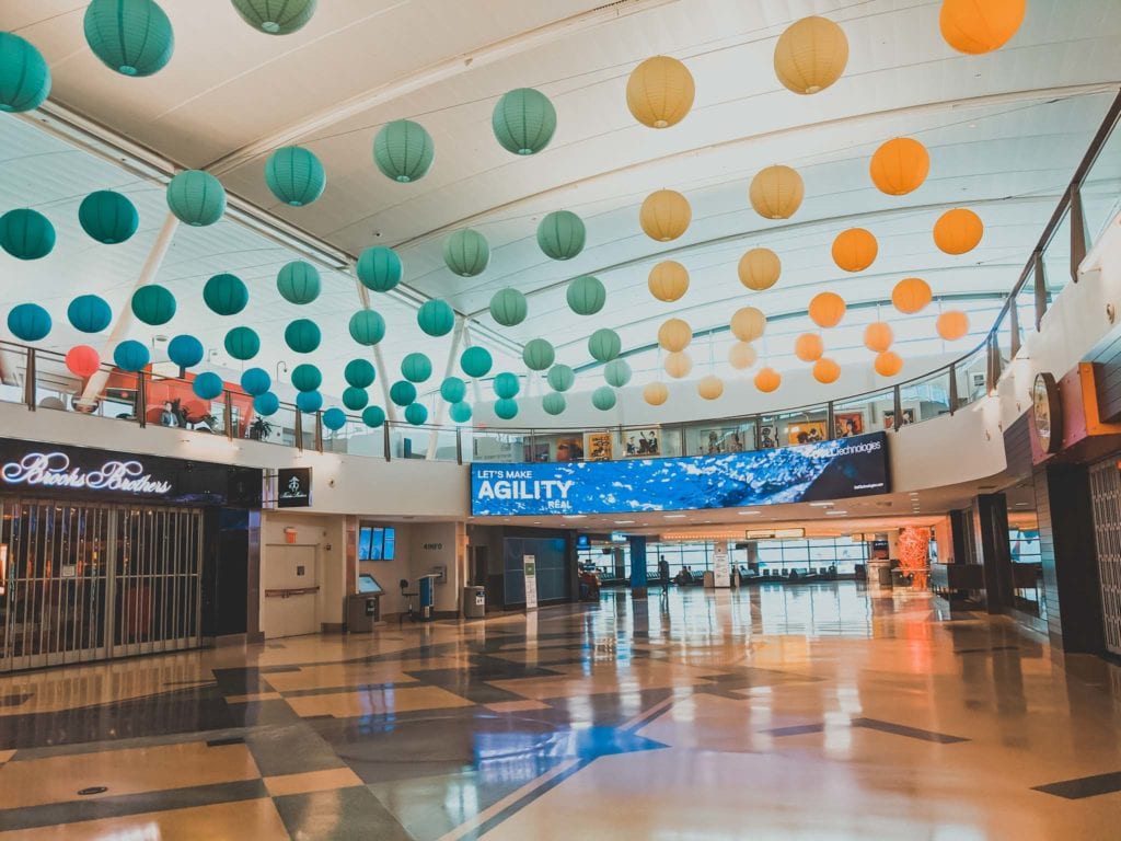 a large hall with colorful lanterns