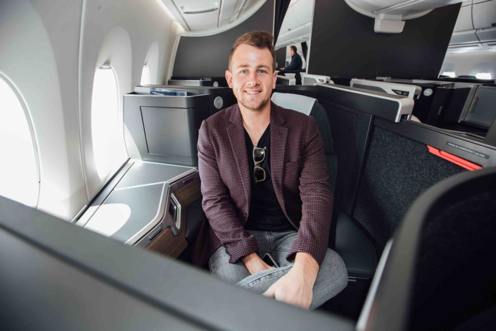 a man sitting in an airplane