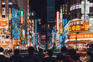 Tokyo, Japan - Jan 11, 2019: Crowded people and car traffic at Kabukicho, entertainment night life and red-light district in Shinjuku Tokyo