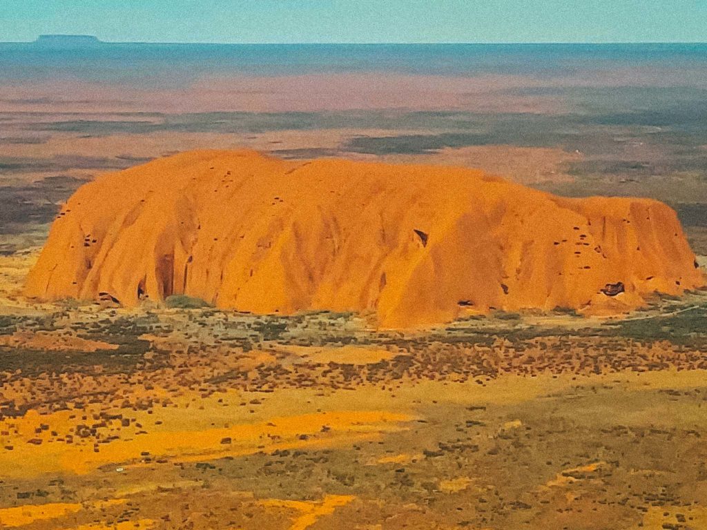 a large orange rock formation