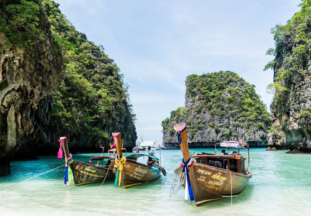 boats in the water with a group of boats