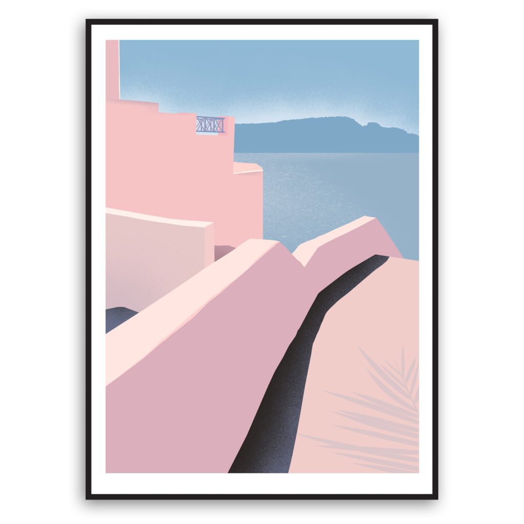 a framed picture of a pink building