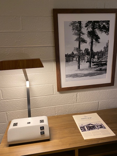 a picture of a picture and a lamp on a table