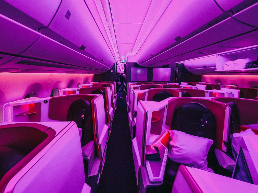 inside an airplane with purple lights