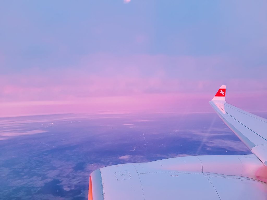 an airplane wing in the sky