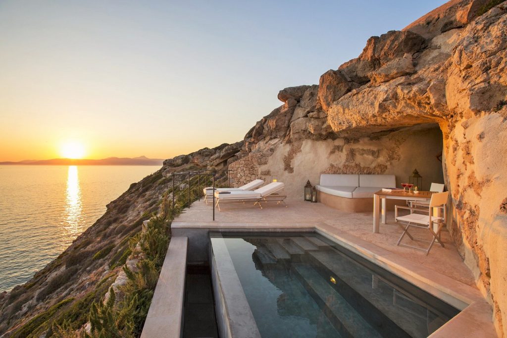 a pool with a pool on the side of a cliff
