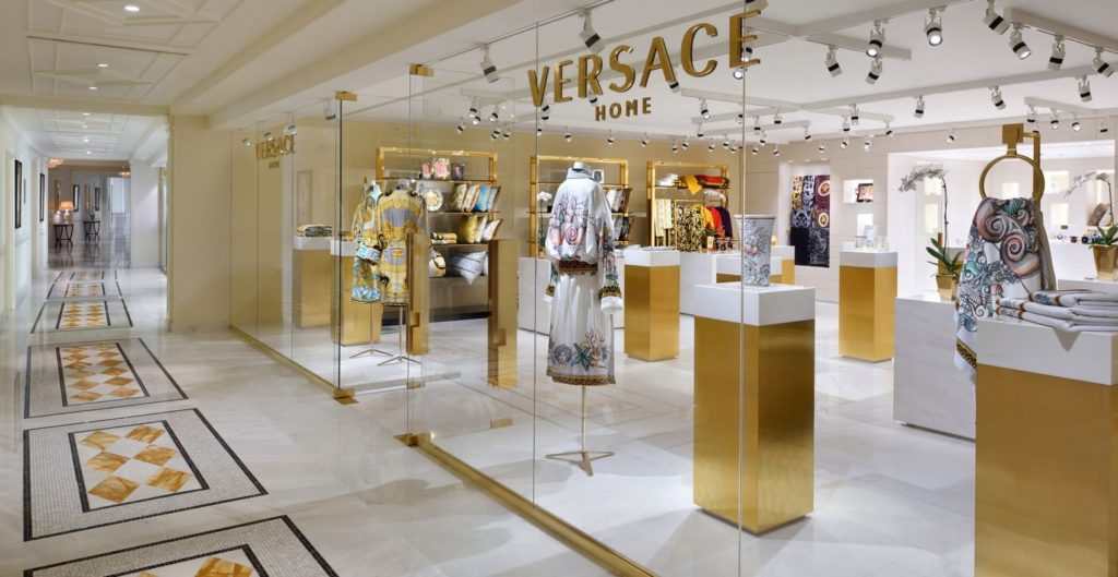 a store with gold and white display