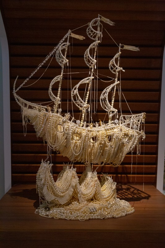 a sculpture of a ship made of pearls